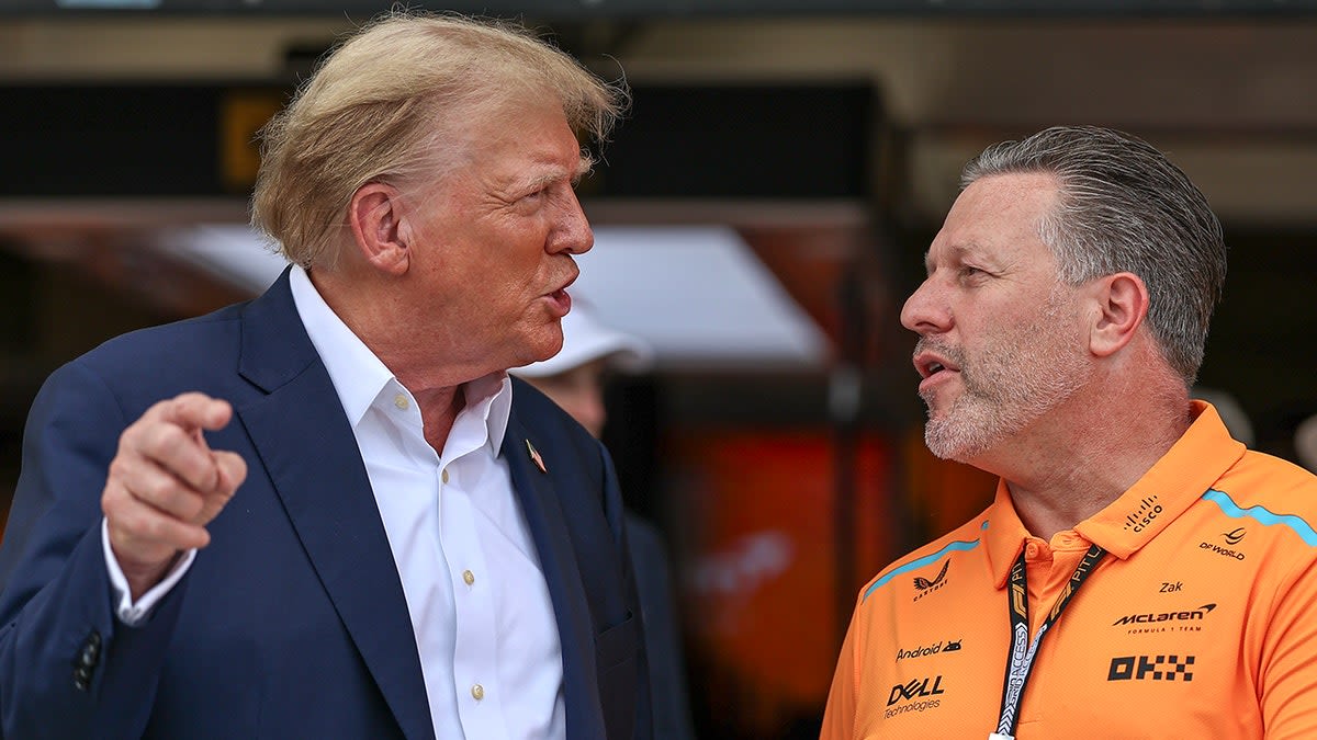 Donald Trump waves to crowd, salutes during national anthem at F1 Miami Grand Prix