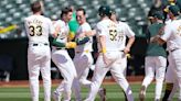 A's hit 2 tying homers in late innings and score 5 in 11th to rally past Rockies