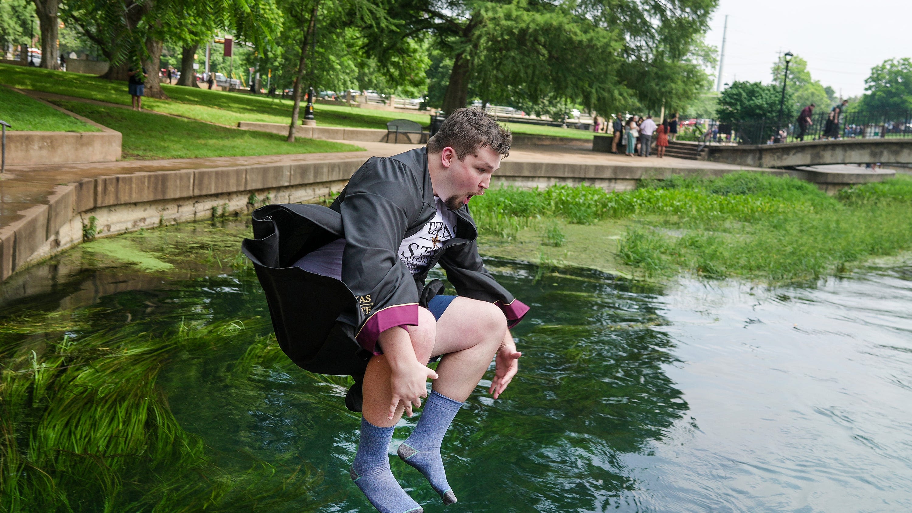 Texas State College of Science and Engineering celebrates graduation with river jump