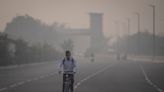 Masks are back, construction banned and schools shut as toxic air engulfs New Delhi