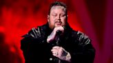 Jelly Roll Unveils Sneak Peek Of Unreleased Anthem On Historic Nashville Stage | iHeartCountry Radio