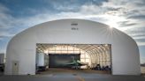 Watch NASA's sci-fi-looking X-59 'quiet' supersonic jet roll out of the hangar (video)
