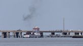 Barge hits Texas bridge, spilling oil and trapping people on island