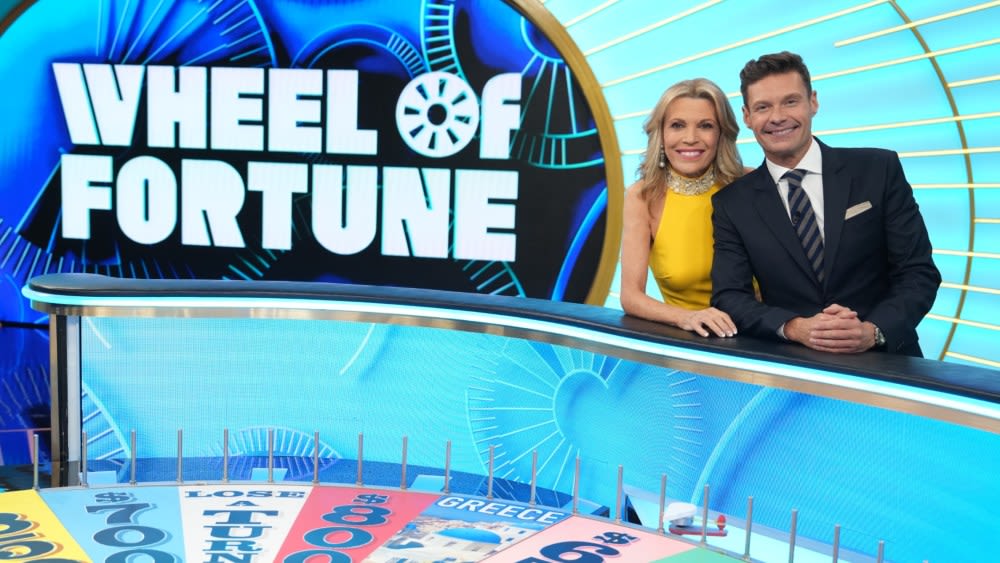 Ryan Seacrest on His First Days Hosting ‘Wheel of Fortune’ With Vanna White and Pat Sajak’s Parting Advice: ‘It’s Very Full...