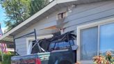 Truck crashes into Everett mobile home