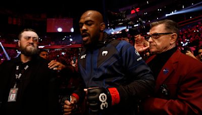 Daniel Cormier defends Jon Jones against misdemeanor charges: ‘I think he was bombarded a little bit’