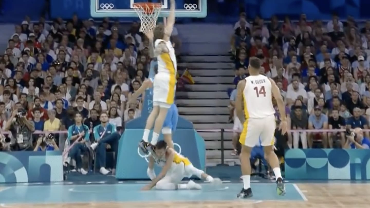 Rudy Fernandez Helped to the Locker Room After Getting Kicked in the Head by Teammate