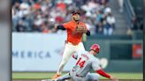 Angels quell late Giants rally for 8-6 victory