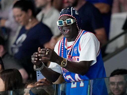 Flavor Flav meets with FLOTUS Jill Biden during US women’s water polo match