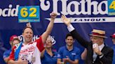Joey Chestnut shakes off rain delay and defends title at Nathan's Fourth of July hot dog contest