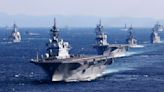 Japan defense chief urges higher security after drone video of warship posted on China social media