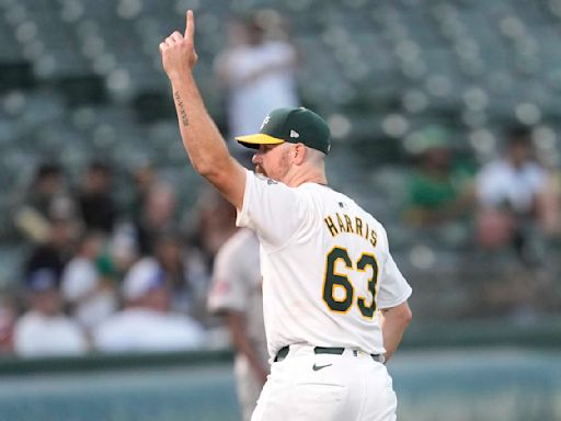 Hogan Harris and 3 Athletics relievers combine to blank Astros 4-0