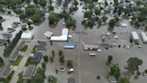 Flooding forces people from homes in some parts of Iowa while much of US toils again in heat