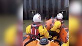 Rescuers Rev Their Boat When They Spot Someone Clinging To River Wall For Dear Life