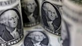U.S. dollar holds seven-week high after strong inflation data