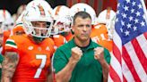 Miami AD gives game ball to Cristobal, who gives it to players. ‘Energy through the roof’