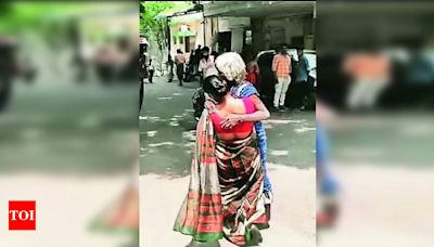 Woman carries mom in hands as govt hosp denies her stretcher | Coimbatore News - Times of India