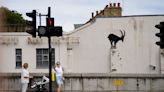 Banksy reveals new London artwork of goat perched on a wall