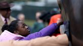 People awed, honored by 'The Embrace' as MLK tribute sculpture unveiled in Boston