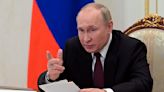 Putin monitors practice launches by Russia's nuclear forces