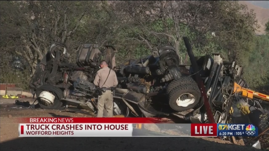 Firefighters fight structure fire after semi truck crashes into Wofford Heights house