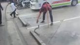 Rescue worker catches deadly cobra by hand after freeing it from mouse trap