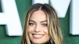 Margot Robbie Leaves Us Speechless In A Black Minidress And Sheer Tights For Her Latest Photoshoot