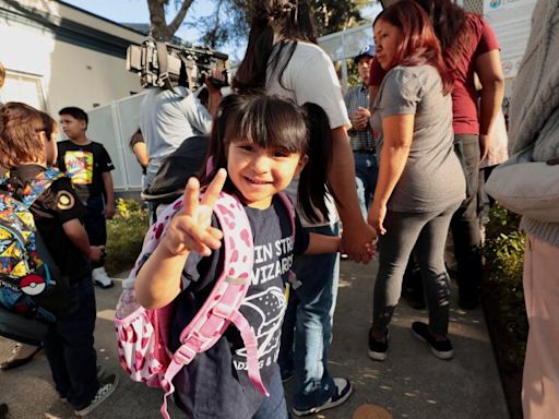 Smiles, 'butterflies' and a little boy cries 'I want my mom.' It's LAUSD's first day of school