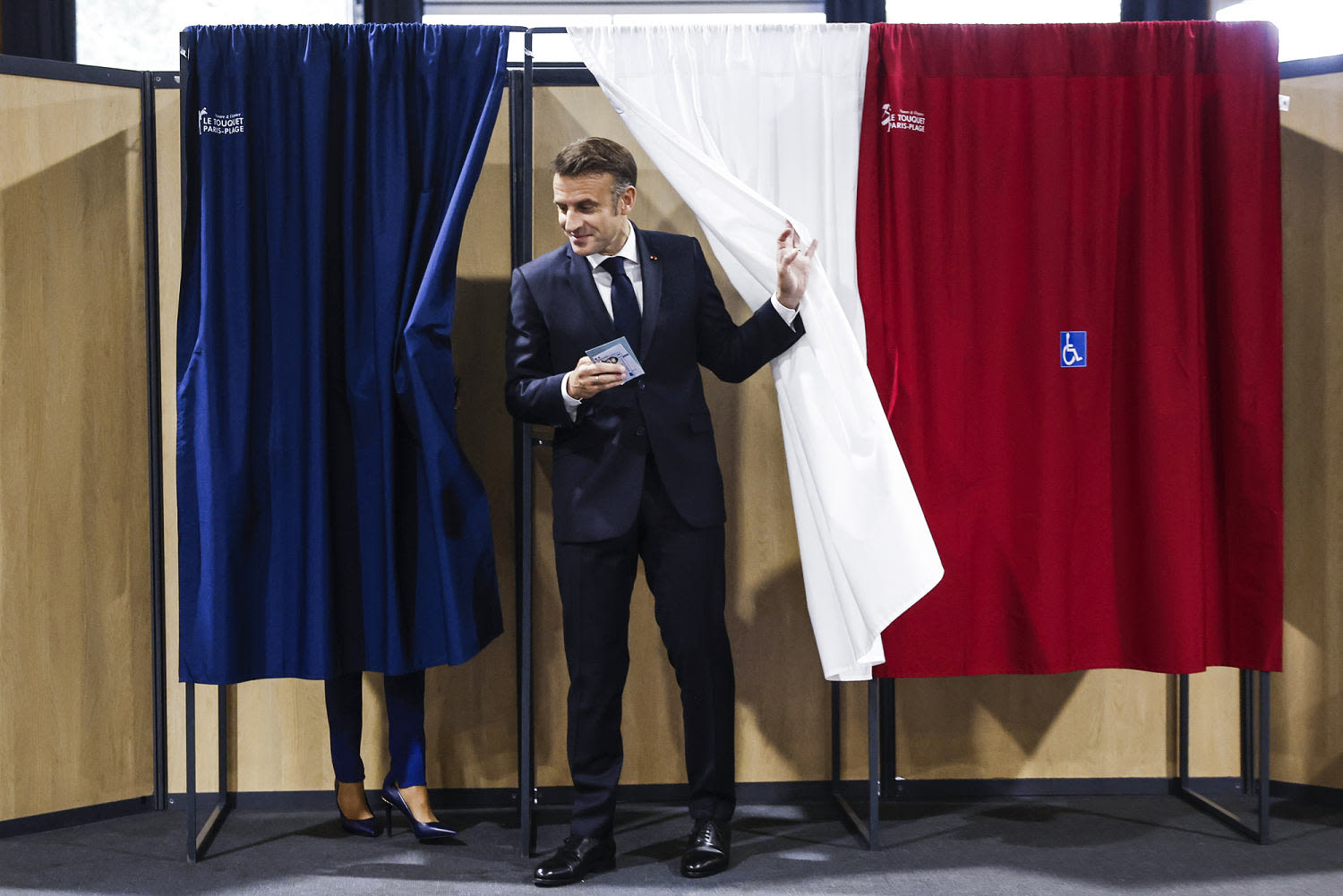 France’s left-wing parties projected to finish first in parliamentary elections, keeping far right at bay