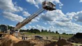 Worker rescued after falling 30 feet into pit at Suffolk construction site