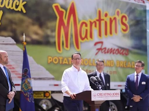 Gov. Josh Shapiro breaks bread with Martin’s Potato Rolls, one of Doug Mastriano’s top supporters