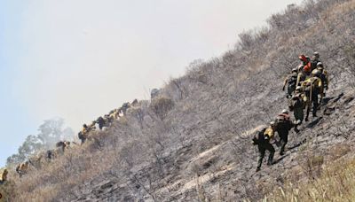 Hillside fire brings Highway 101 traffic over Cuesta Grade to stand still