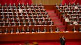 China’s Xi calls for military growth as party congress opens