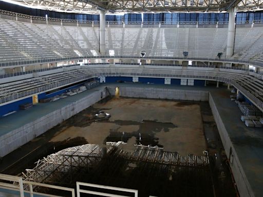 Olympic venues let to rot… including decaying village taken over by squatters