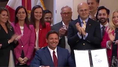 Gov. Ron DeSantis signs law combatting human trafficking, raising age for strippers