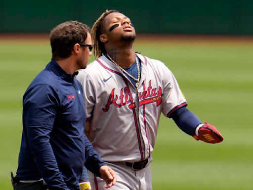 Braves' Acuña expects to go on injured list after left knee buckles during game vs. Pirates