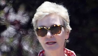 Jane Lynch sports patriotic colors with a cute pup on Fourth of July