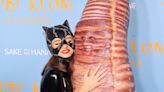 Heidi Klum and her daughter Leni embraced on the red carpet while dressed as Catwoman and a giant worm