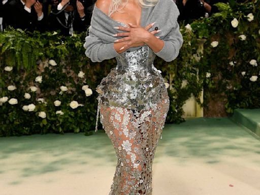 Fans are divided over Kim Kardashian’s Met Gala sweater. She explains why she wore it