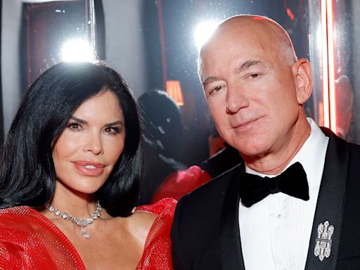 Lauren Sanchez's Bond Girl moment in gold bikini while jet skiing with Jeff Bezos — see photos