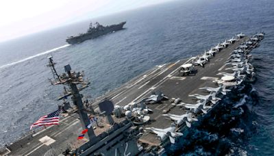 US aircraft carrier group accelerates toward Middle East as tensions soar