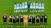 Footballer James McClean stands apart during minute's silence to Queen