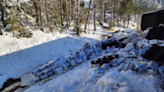 Mountains turn blue as Coors Light semi overturns, scattering cans across interstate