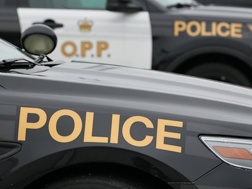 Man dead after flying wheel strikes coach bus on QEW: OPP