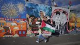 Murals by Gazan artists recreated on Belfast wall in show of solidarity