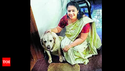 True love: Family conducts 'bali' ritual for pet dog Emi in Kerala | Kozhikode News - Times of India