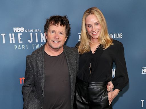 Michael J. Fox Totally Enamored by Wife Tracy Pollan’s Red Carpet Look in New Photos