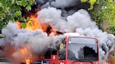 Moment London bus erupts in huge fireball as firefighters rush in