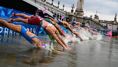 Women’s triathlon begins at Paris Games after tests confirm Seine water quality