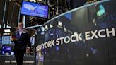S&P 500 ends choppy session nearly flat; investors eye Fed, earnings